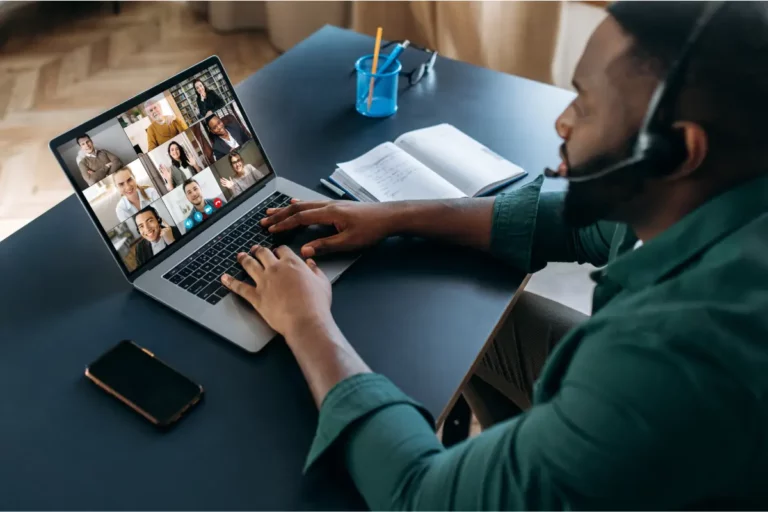 Employee working remotely and attending a meeting